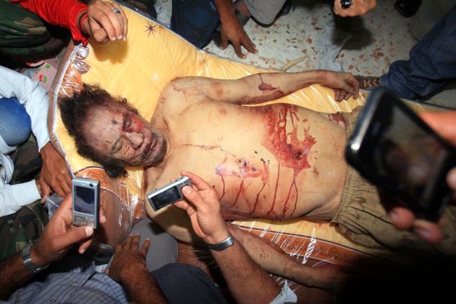 Image result for Gaddafi's dead body half naked